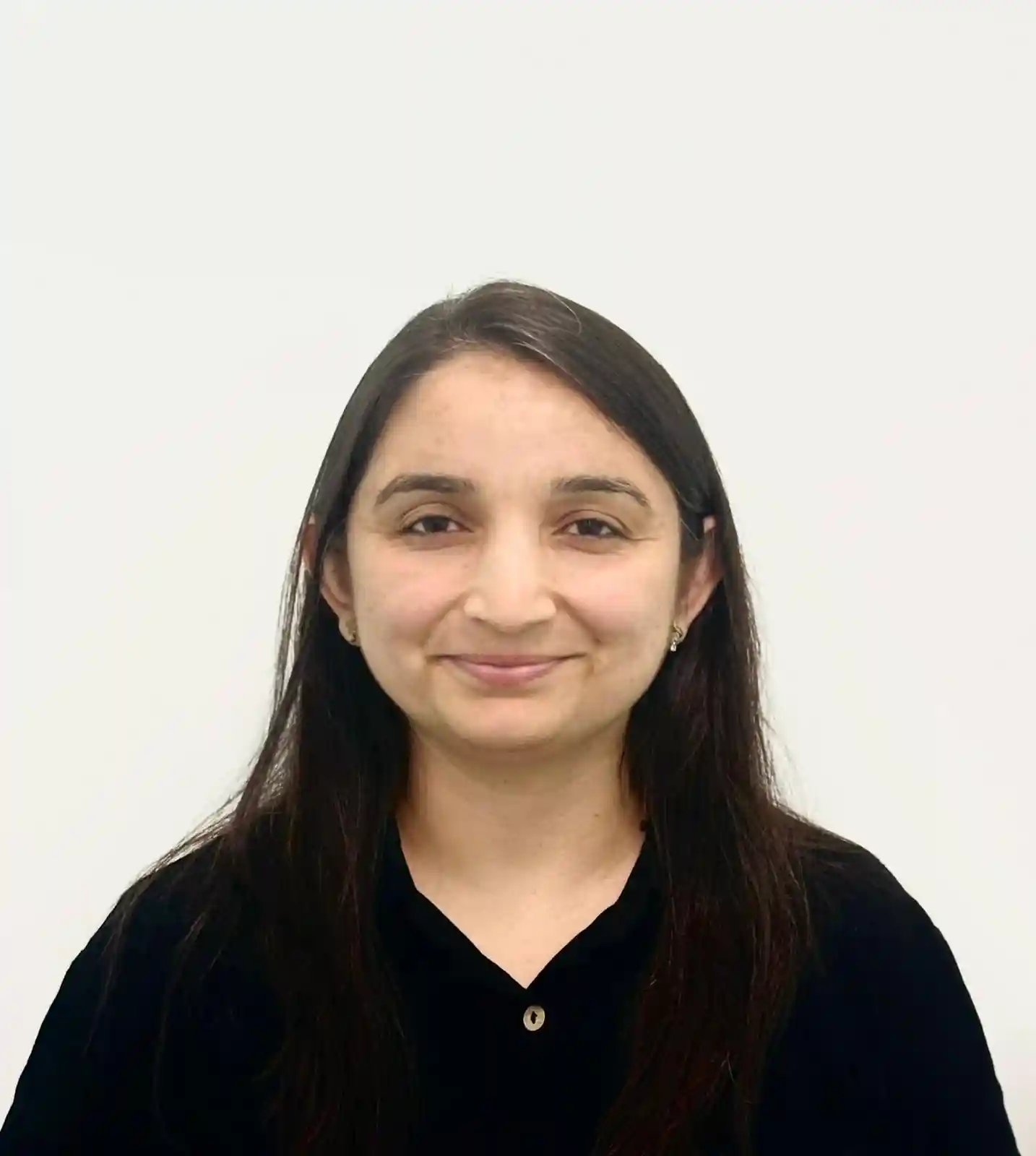 Experienced businessman smiling in a modern office