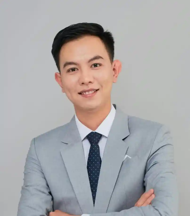 Tech-savvy man using a laptop at a modern workspace