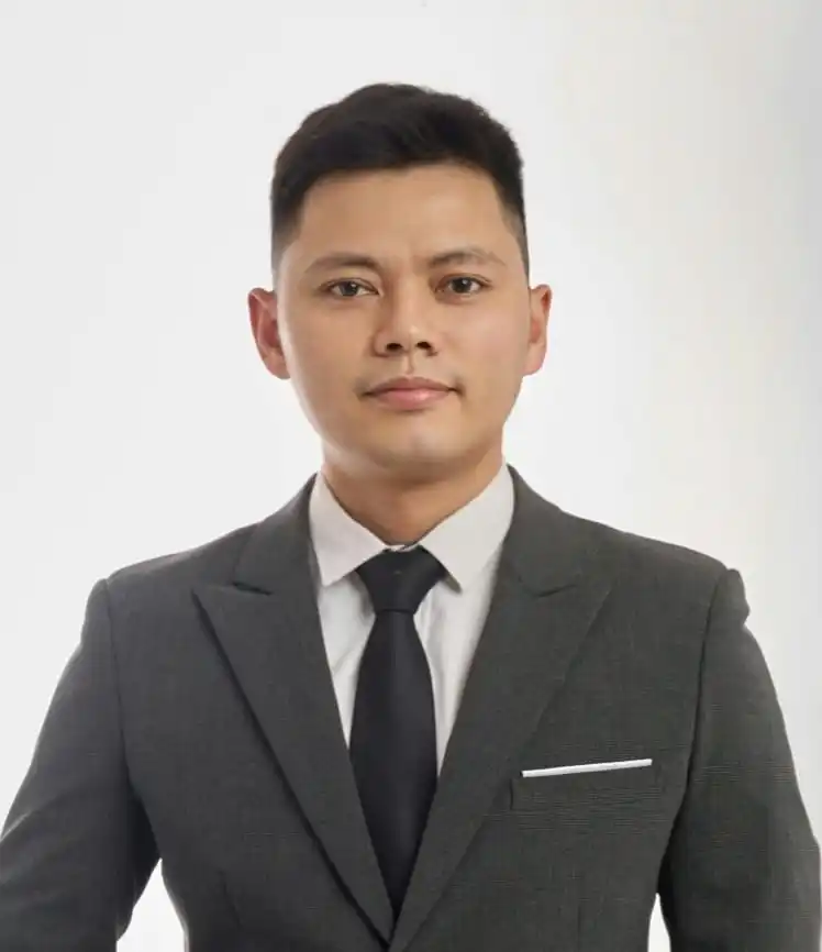 Young professional woman working on a laptop at home office