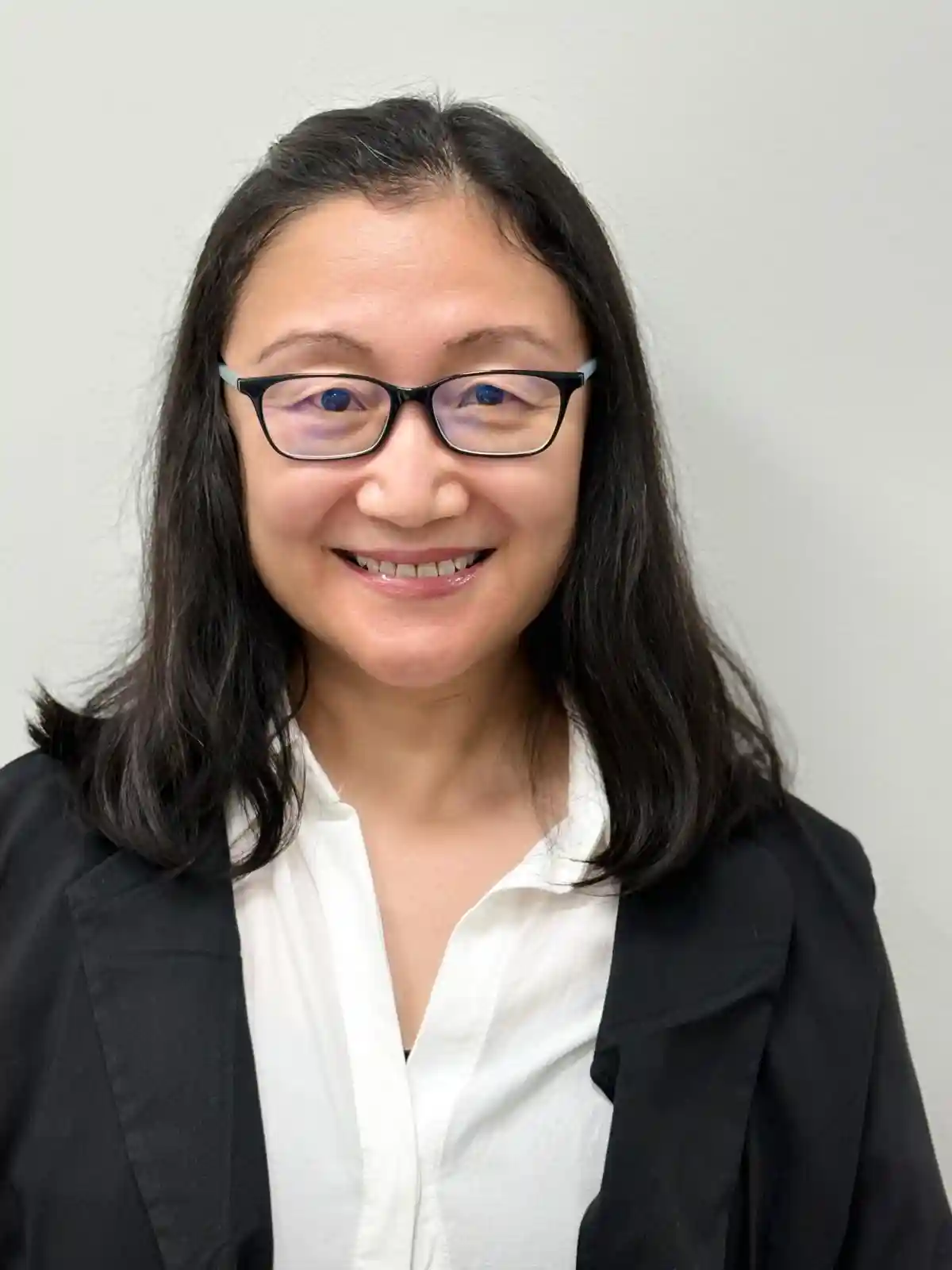 Focused young woman working at her desk